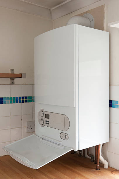 White combi boiler installed in a UK residential property
